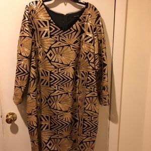 Black and gold sequence dress